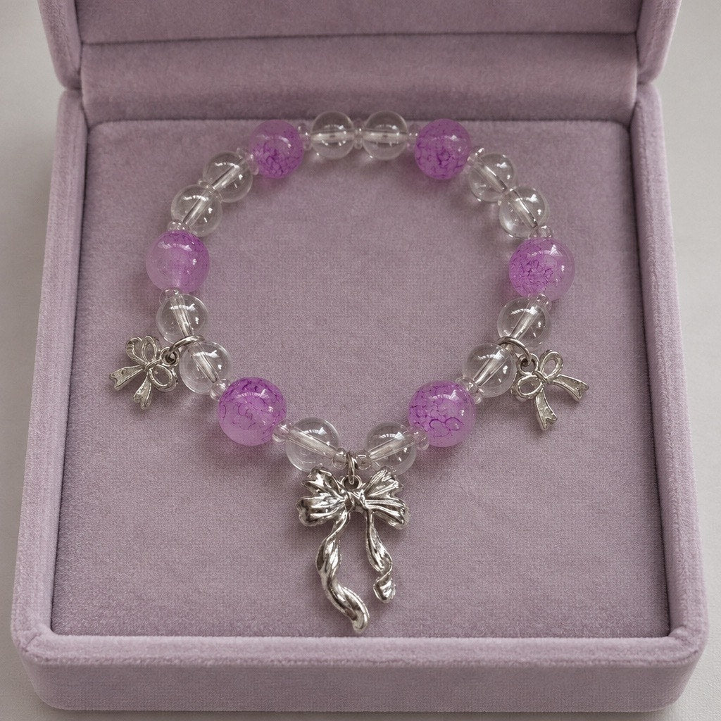 Silver plated Bow Pendant Bracelet with Lilac Glass Beads
