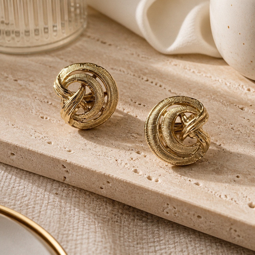 The Vivienne Clip — Chunky Interlocking Gold-Plated Textured Love Knot Earrings
