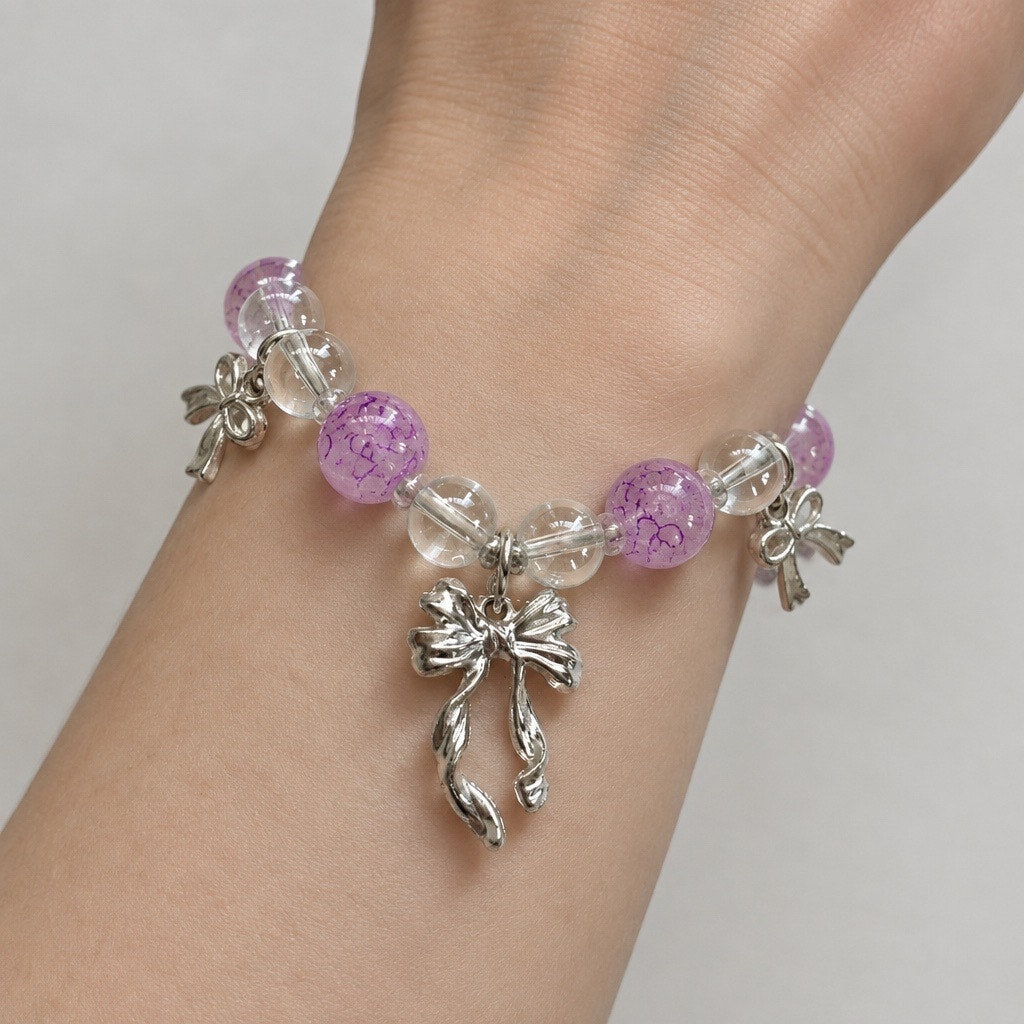 Silver plated Bow Pendant Bracelet with Lilac Glass Beads