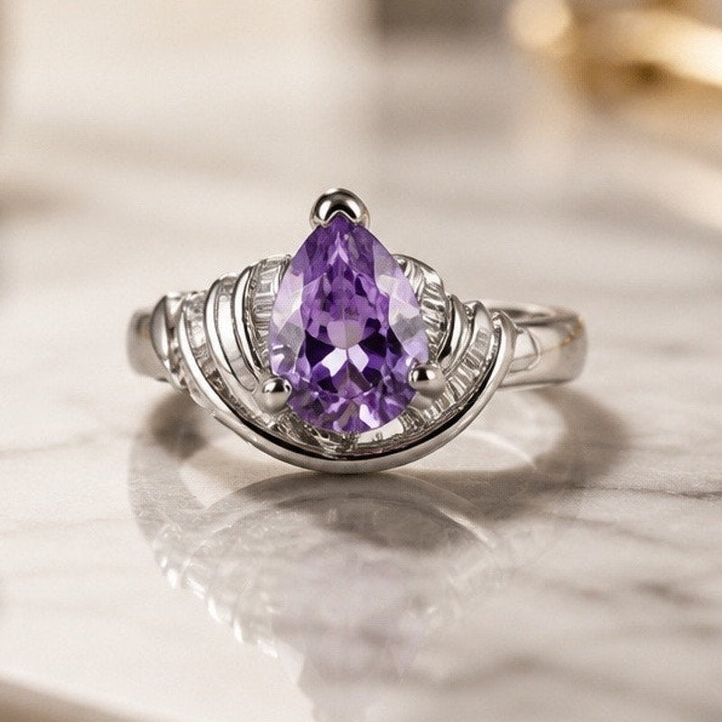 The Lilac Blossom Ring – Pear Cut Amethyst Stone in Silver Ribbon